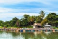 KANCHANABURI-THAILAND,AUGUST 30,2019 : Beautiful scenery view of Nile Red Tilapia fish cages aquaculture floating with floats from