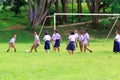 KANCHANABURI, Thailand -AUGUST 25, 2017: Thai student playing football on green field in the school