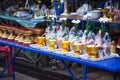 Kanchanaburi, Thailand - December 30, 2018: Alms prepared for Almsgiving food offerings to Buddhist monks going on daily alms