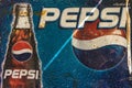 KANCHANABURI, THAILAND-DECEMBER 29,2019 : Close up vintage pepsi cola logo banner, old rusty and broken zinc plate of pepsi soft