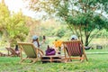 KANCHANABURI THAILAND - JANUARY 11 : Unidentified couple come to visit and sitting on garden chairs to relax on January 11,2020