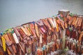 Prayer tags tied on the bridge in the Pilok mine village in kanchanaburi City Thailand.