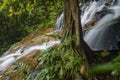 Kanching Waterfall located in Malaysia, amazing cascading tropical waterfall. wet and mossy rock, surrounded by green rain forest Royalty Free Stock Photo