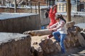 Two Iranian girls playing on the street in rock village Kandovan. Iran