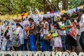 KANDY, SRI LANKA - JULY 19, 2016: White clothed buddhist pilgrims visit Wel Bodiya with Bodhi tree during Poya Full Moon