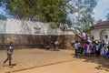 KANDY, SRI LANKA - JULY 19, 2016: White clothed buddhist pilgrims visit Wel Bodiya with Bodhi tree during Poya Full Moon