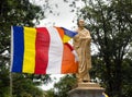 The statue of the reformer of Modern Sri Lanka and the flying flag of Sri Lankan Buddhism.