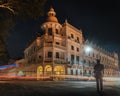 Kandy sri lanka queen`s  hotel at night with traffic light trails and a police man Royalty Free Stock Photo