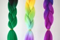 Kanekalon. Colored artificial strands of hair. Material for plaiting braids.