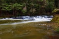 The fast flowing Kangaroo River at Belmore Fall, NSW, Australia