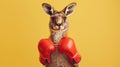 A kangaroo is wearing boxing gloves and standing in front of a yellow background