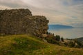 KANINE, ALBANIA: Beautiful landscape with views of the old fortress walls of Kanina Castle.