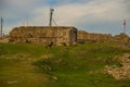 KANINE, ALBANIA: Beautiful landscape with views of the old fortress walls of Kanina Castle.