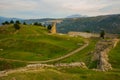 KANINE, ALBANIA: Landscape to ruined Kanine Castle and mountain.