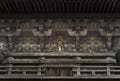 Kannon boddhisatva and manekineko cat carved on the pagoda of gotokuji temple.