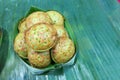 Kanom Krok, a sweet Thai dessert recipe in a banana leaf container