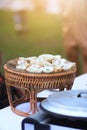 Kanom Krok is Thai Sweet dessert and savory grilled coconut-rice hotcakes in basket Royalty Free Stock Photo
