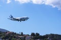 Planes taking off or landing at Kanoni,over the church of Panagia Vlacherna and the Mouse Island on the Greek Island of Corfu. Royalty Free Stock Photo