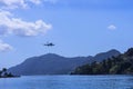 Planes taking off or landing at Kanoni,over the church of Panagia Vlacherna and the Mouse Island on the Greek Island of Corfu. Royalty Free Stock Photo