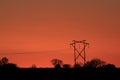 Kansas Blazing red Sunset with powerlines out in the country