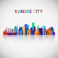 Kansas City skyline silhouette in colorful geometric style.