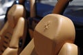 Leather interior of Ferrari sports car with an emblem on the headrest, Kansas City, USA