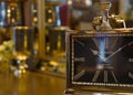 Closeup selective focus shot of a classy brass clock and accessories