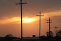 Kansas Sunset with a colorful sky with power line silhouettes