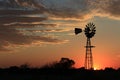 Kansas Windmill Silhouette with Orange Sky Royalty Free Stock Photo