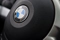 Kant, Kyrgyzstan - August 20 , 2021 : Bmw steering wheel . Logo close up