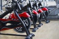 Kant, Kyrgyzstan- March 01 , 2019 : Row of training exercise bikes detail. Healthy lifestyle concept