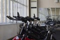Kant, Kyrgyzstan- March 01 , 2019 : Row of training exercise bikes detail. Healthy lifestyle concept