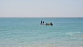 Tamilnadu fishermen getting their wooden boat or catamaran for fishing in Bay of Bengal Royalty Free Stock Photo