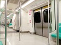 Kaohsiung, Taiwan - February 3, 2024: Kaohsiung Metro (KMRT) train interior seating area, departure station, Royalty Free Stock Photo