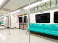 Kaohsiung, Taiwan - February 3, 2024: Kaohsiung Metro (KMRT) train interior seating area, departure station, Royalty Free Stock Photo