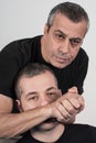 Kapap instructor demonstrates choke techniques Royalty Free Stock Photo