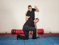 Kapap instructor demonstrates standing arm lock techniques