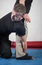 Kapap instructor demonstrates standing arm lock techniques Royalty Free Stock Photo