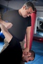 Kapap instructor demonstrates standing arm lock techniques Royalty Free Stock Photo