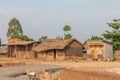 Kapapi / Uganda - Februari 26 2020: Two Ugandan children in ragged clothes playing in front of their houses.