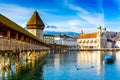 Kapellbrucke historic Chapel Bridge and waterfront landmarks in Lucern, Switzerland Royalty Free Stock Photo