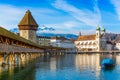 Kapellbrucke historic Chapel Bridge and waterfront landmarks in Lucern, Switzerland Royalty Free Stock Photo