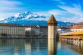 Kapellbrucke historic Chapel Bridge and waterfront landmarks in Lucern, Switzerland Royalty Free Stock Photo