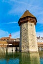 Kapellbrucke historic Chapel Bridge and Water Tower landmarks in Lucern, Switzerland Royalty Free Stock Photo