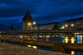 Kapellbruecke at night with a wooden beam in the foreground. Royalty Free Stock Photo