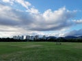 Kapiolani Park and Buildings of Honolulu with clouds in the air