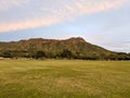 Kapiolani Park at dusk with Diamond Head and clouds