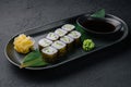 Kappamaki - cucumber sushi roll on black plate Royalty Free Stock Photo