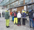 KAPRUN, AUSTRIA, March 12, 2019: People skiers buyingtheir ski pass at tickets office at Kitzsteinhorn ski resort on