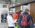 KAPRUN, AUSTRIA, March 12, 2019: People skiers buyingtheir ski pass at tickets office at Kitzsteinhorn ski resort on